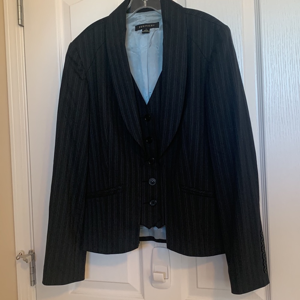 Periphery style Blazer with fake matching vest for dressy look.